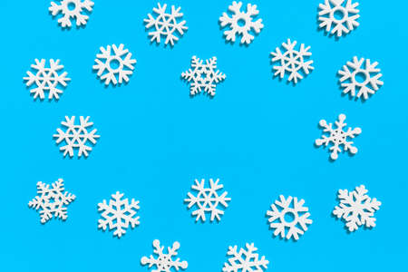 Christmas or winter composition. Pattern made of snowflakes on blue background. Christmas, winter,...