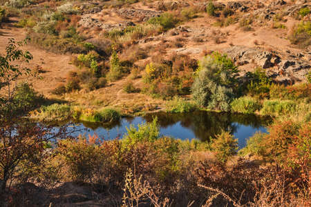 Scenery of Ukrainian Canyon, Lake in the mining mountainl of Canyon at the Stone Mine.