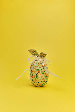 Easter bunny handmade gift egg wrapping diy idea. Minimal easter conceptの写真素材