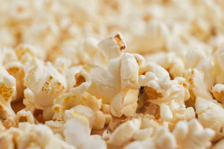 Pile of popcorn closeup macro shot, selective focus