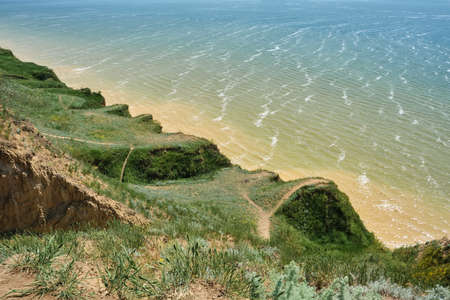 Beautiful landscape, sandy cliff over the sea. Spring. travel concept. beautiful nature. Ukraine.の写真素材