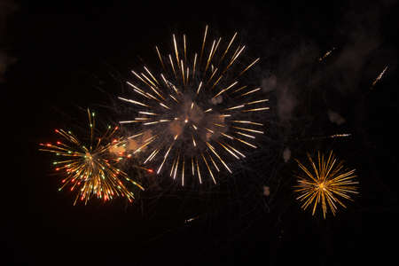 Beautiful fireworks display lights up the sky during night time celebrationの写真素材