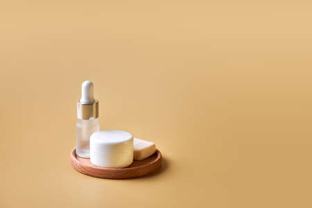 SPA composition. Set of copyspace cosmetic bottles and tubes. Face and body care concept, bottles of creams, lotions, serums. Selective focus, allow DOF, close up.の写真素材