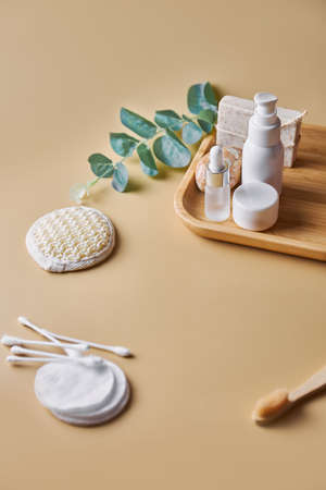 Skin and body care products. Face wash, hand made oatmeal soap, soda, cotton pads, brush, bamboo toothbrush. Eco friendly stuff concept. copyspace.の写真素材