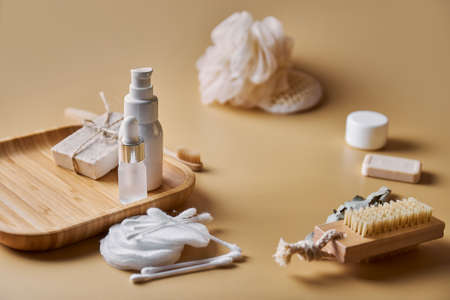 Skin and body care products. Face wash, hand made oatmeal soap, soda, cotton pads, brush, bamboo toothbrush. Eco friendly stuff concept. copyspace.の写真素材