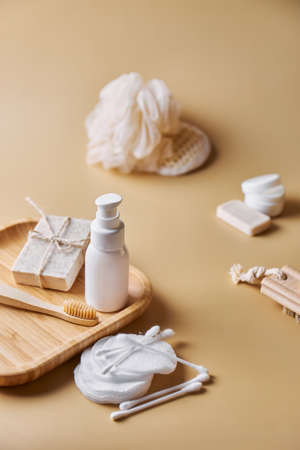 Skin and body care products. Face wash, hand made oatmeal soap, soda, cotton pads, brush, bamboo toothbrush. Eco friendly stuff concept. copyspace.の写真素材