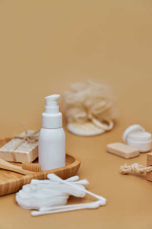 Skin and body care products. Face wash, hand made oatmeal soap, soda, cotton pads, brush, bamboo toothbrush. Eco friendly stuff concept. copyspace.の写真素材