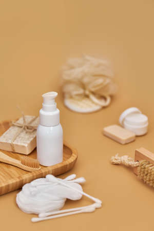 Skin and body care products. Face wash, hand made oatmeal soap, soda, cotton pads, brush, bamboo toothbrush. Eco friendly stuff concept. copyspace.の写真素材