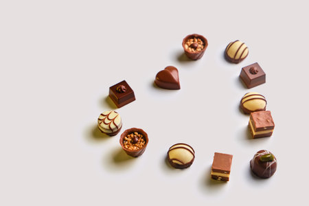 heart shaped assortment of delicious chocolate praline sweets for Valentine's Day, mother's day,...
