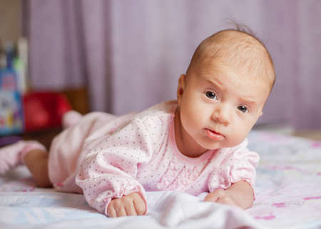 Beautiful smiling cute baby. Beautiful expressive adorable happy cute laughing smiling baby infant face. Children, people, infancy and age concept - beautiful happy babyの写真素材
