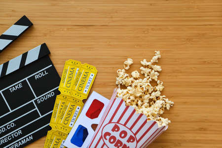 clapper board, movies tickets and popcorn.の写真素材