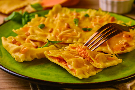 Homemade Pumpkin Ravioli with ricotta cheese served basilの写真素材
