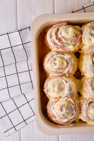 Homemade Pumpkin cinnamon rolls with cream cheeseの写真素材