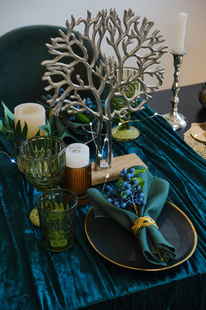 The luxury served table indoors in green colorsの写真素材
