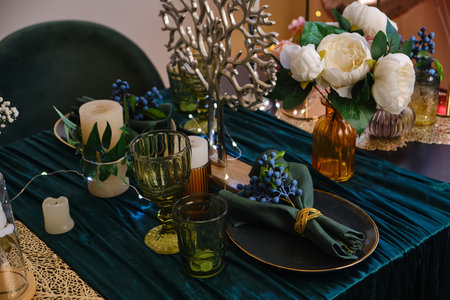 The luxury served table indoors in green colorsの写真素材