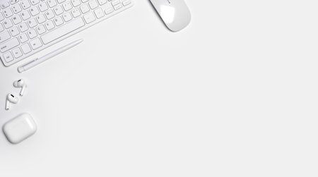 Total white workplace table on white background with copy space.の写真素材