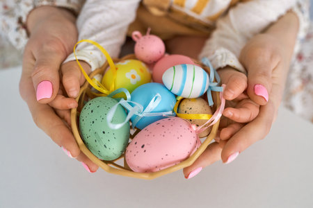 Selective focus on multicolor and design Easter Eggs on the hand.の写真素材