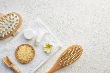 Cosmetic, massage and bath accessories set on white texture backgroundの写真素材