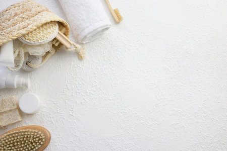 Cosmetic, massage and bath accessories set on white texture backgroundの写真素材
