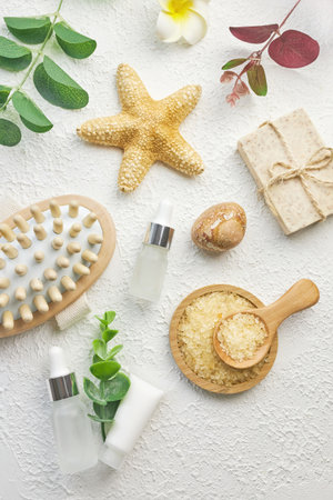 Cosmetic, massage and bath accessories set on white texture backgroundの写真素材