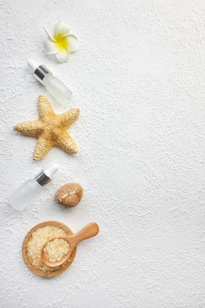 Cosmetic, massage and bath accessories set on white texture backgroundの写真素材