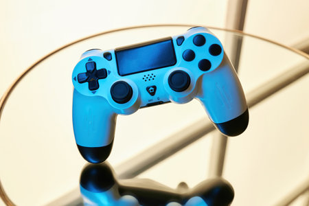 Gamepad on abstract background with light effects. Gamer and Game concept. Gaming background with copy spaceの写真素材