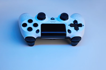 Gamepad on abstract background with light effects. Gamer and Game concept. Gaming background with...