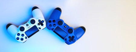 Gamepad on abstract background with light effects. Gamer and Game concept. Gaming wide banner with...