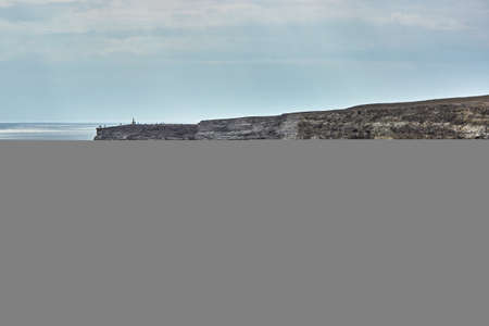 Cape by the sea. Seascape, horizon, calm blue sea. Chalk rocks, Cape Tarkhankut, Crimea. The natural...