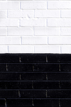 Black and white brick wall background. Spase for text. Verticale. Close up.の写真素材