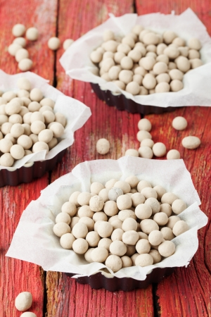 Uncooked shortcrust pastry filled with baking beansの写真素材