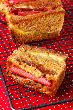 Rhubarb and custard cakes on a red backgroundの写真素材
