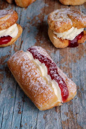 Jam and cream Scones and  doughnutsの写真素材