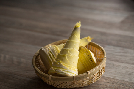 Bamboo shoots in bamboo basketの写真素材