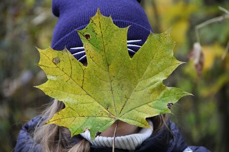 Girl in autumn in the Park
