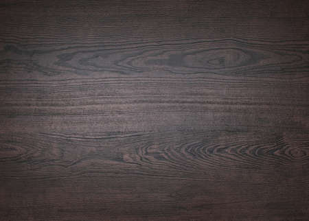 Wooden board texture, dark brown natural wood, grunge backgroundの写真素材