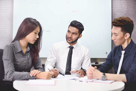 Business people having discussion in meeting roomの写真素材
