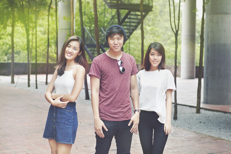 Friends hanging out together at a parkの写真素材