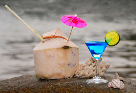 Fresh Coconut Cocktail on the beachの写真素材
