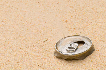 Metallic Can on a Beach Pollution Abstractの写真素材