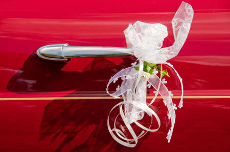 Bridal limousine handle with white decorationsの写真素材