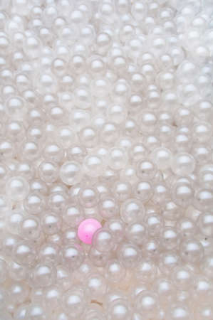 balloons and an odd pink one in betweenの写真素材