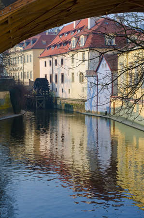 View of old Prague waternill wheel on Chertovka riverの写真素材