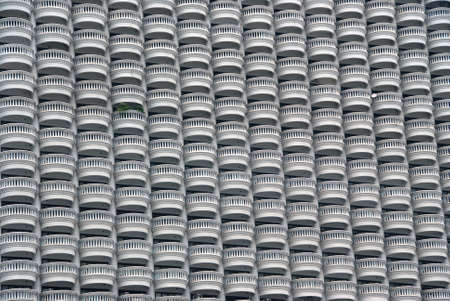 Multi storey building with many balconies backgroundの写真素材