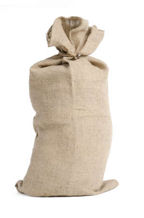 Full big sack with a string, isolated on whiteの写真素材