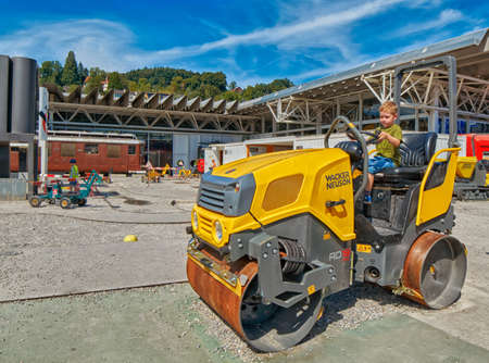 LUZERN, SWITZERLAND - 10 August 2016: Child boy enjoying construction site playground in Swiss...