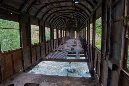 Inside Strange bridge made from old abandoned train car in Georgiaの写真素材