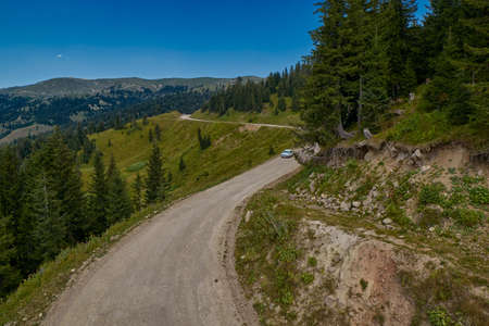Challenging mountain unpaved road Akhaltsikhe-Batumi and Rural mountain landscapes of Georgian Adjara region near Goderdzi ski resort and village of Khuloの写真素材