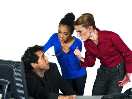 female employees blaming male co workerの写真素材