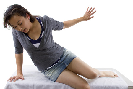 unconscious woman waking up. isolated for composites.の写真素材